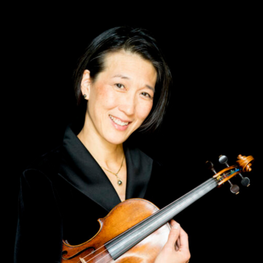 Lucia Lin holding her violin.